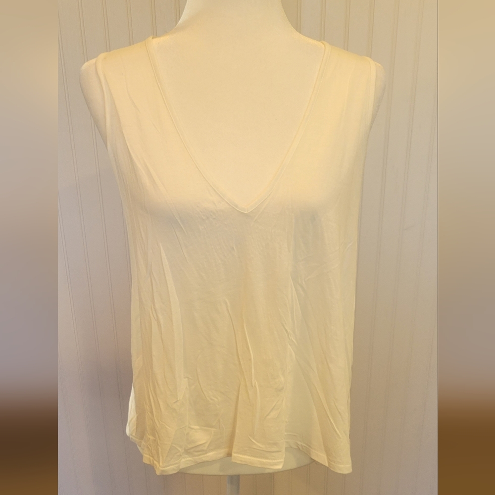 Free people movement size lg white tank with back cutout detail